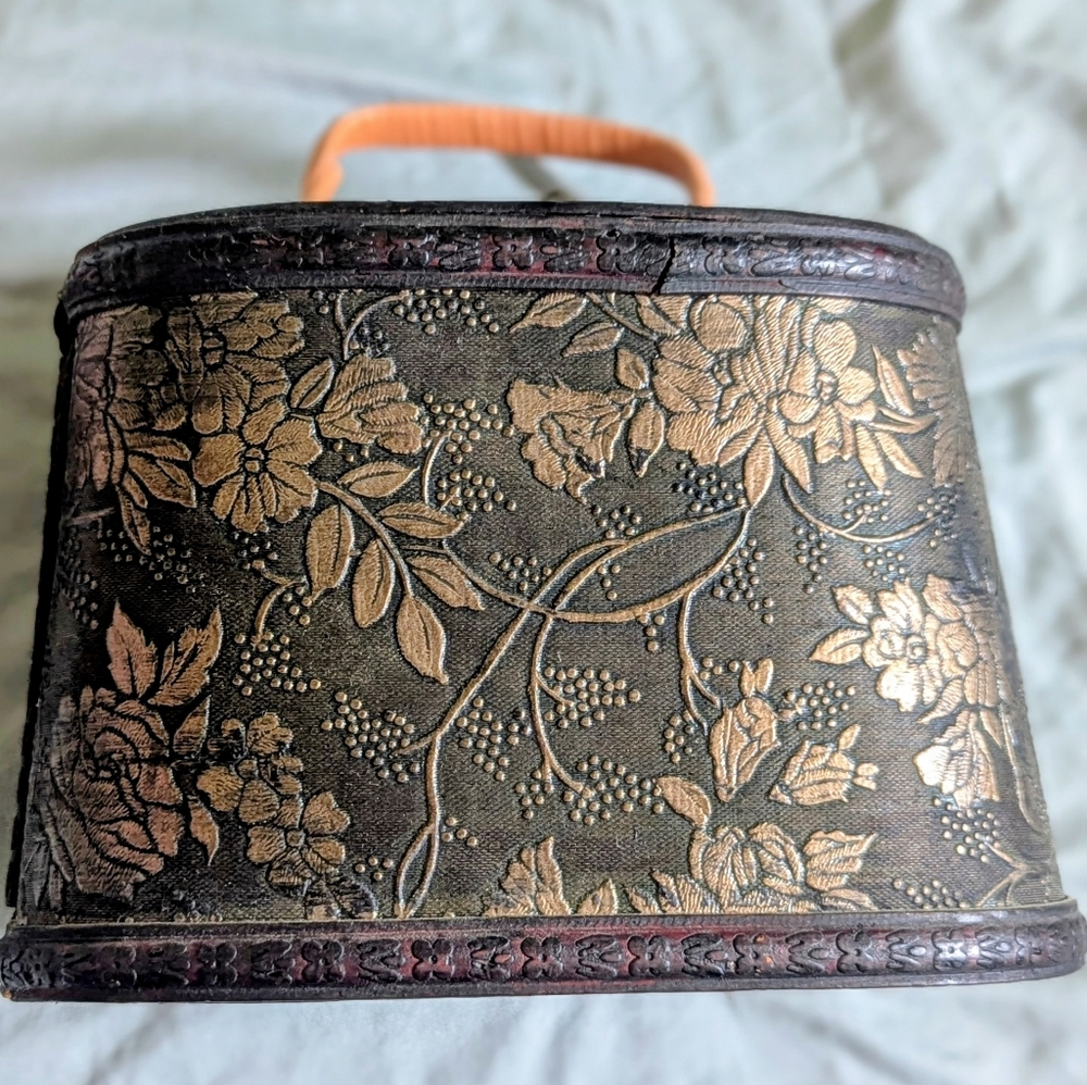 Floral Embossed Handbag with Gold Accents